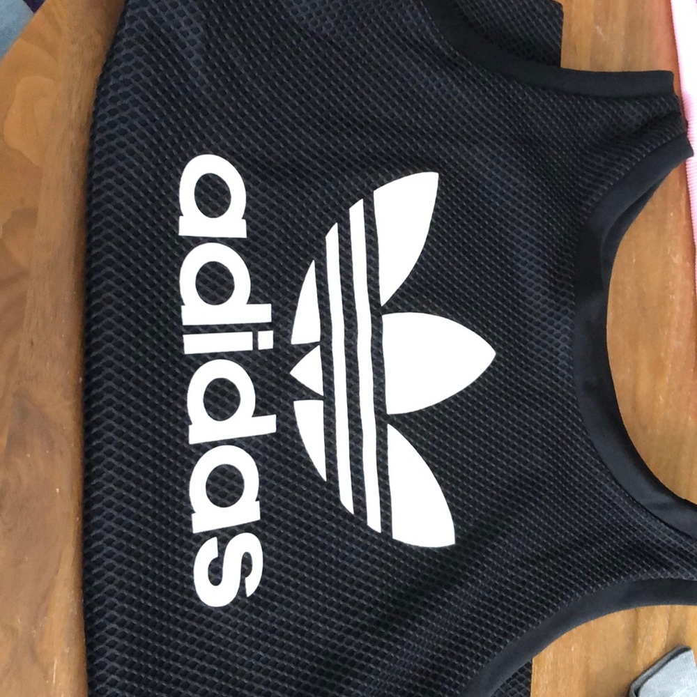 Black and white adidas tank